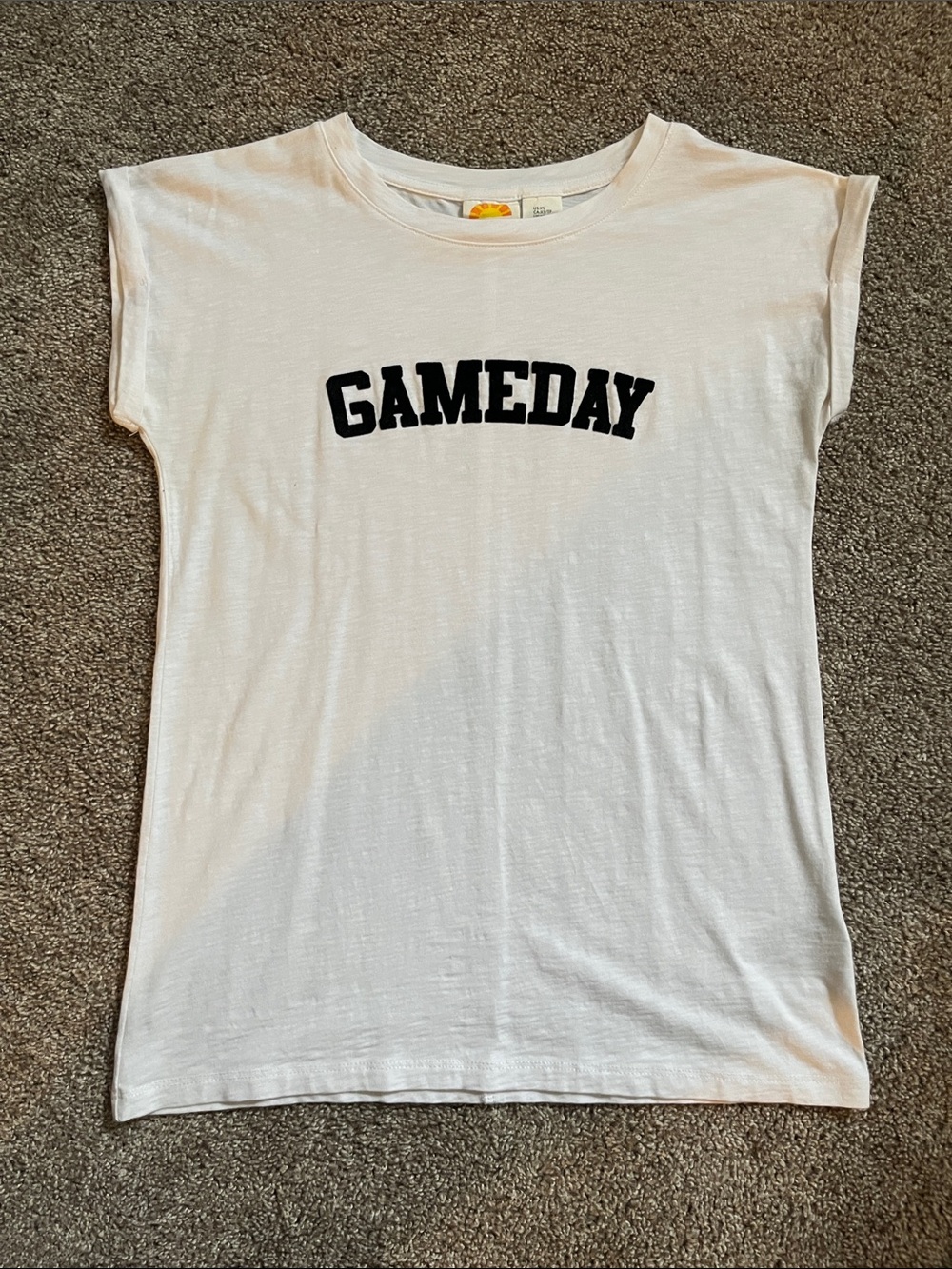 Women’s white crew neck tee with GAMEDAY graphic size XS